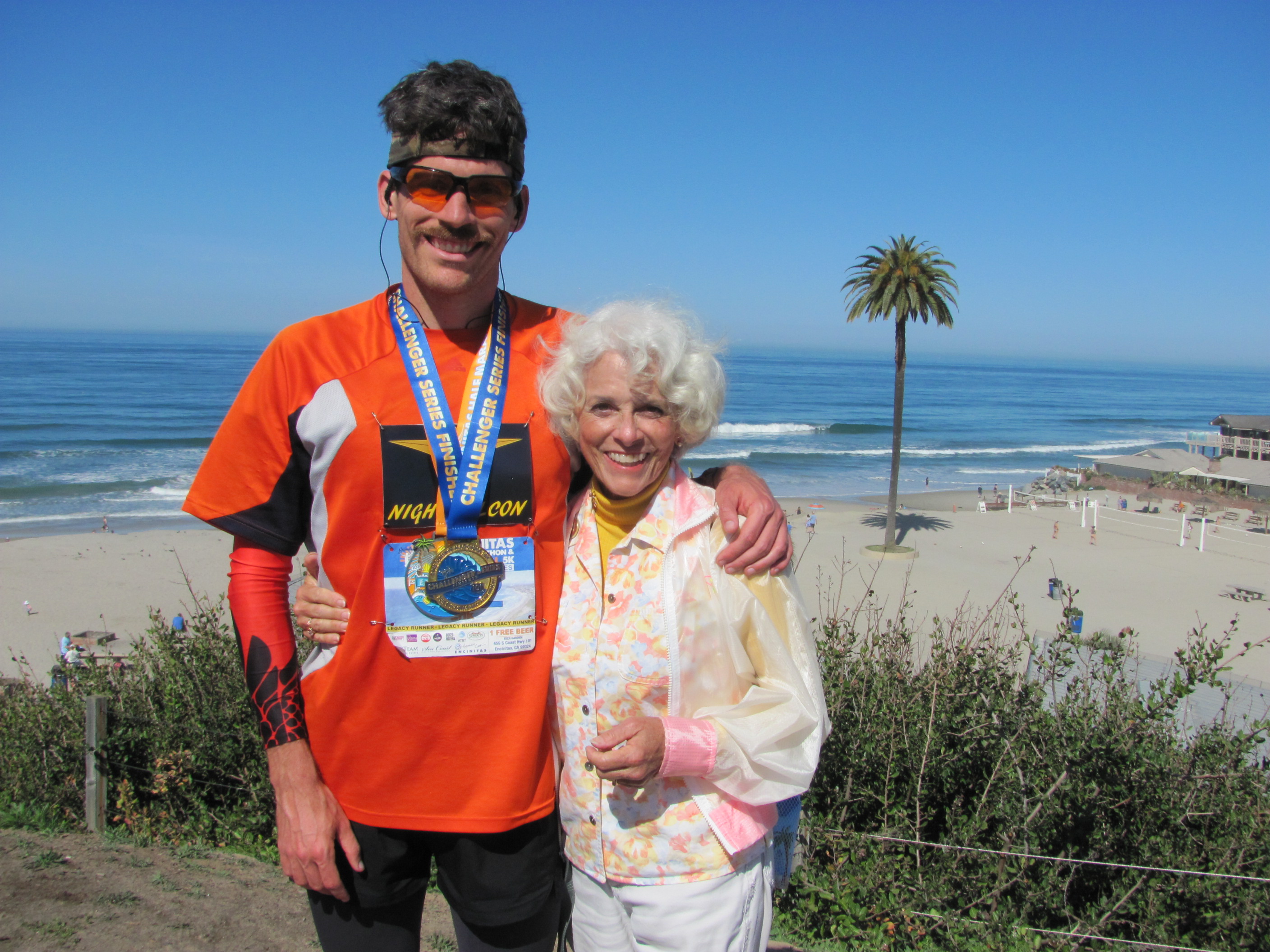 Erik Weber and his mom, Sandi, mentor students with special needs. Weber also leads his “Skybirds” running team for special needs students and has himself participated in over 100 races.